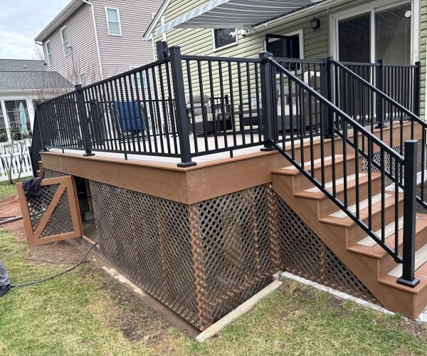 Composite deck with aluminum railing